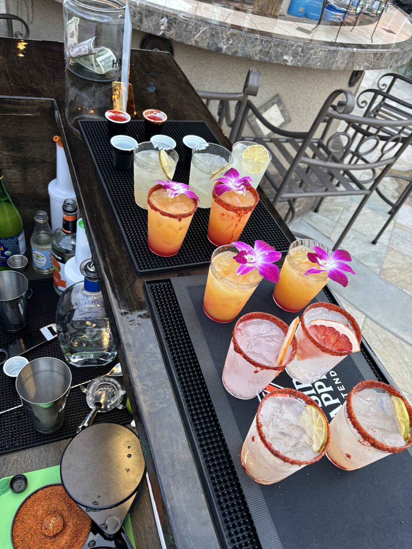 Bar tools, tequila and rimmed glasses ready to go on the Sip Happens mobile bar